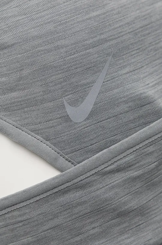 Kukla Nike sivá