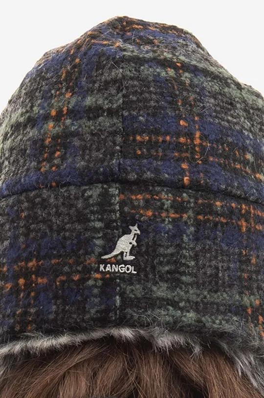 Вълнена шапка Kangol Wool Ushanka  Основен материал: 50% полиестер, 50% вълна Външно оформление: 100% полиестер