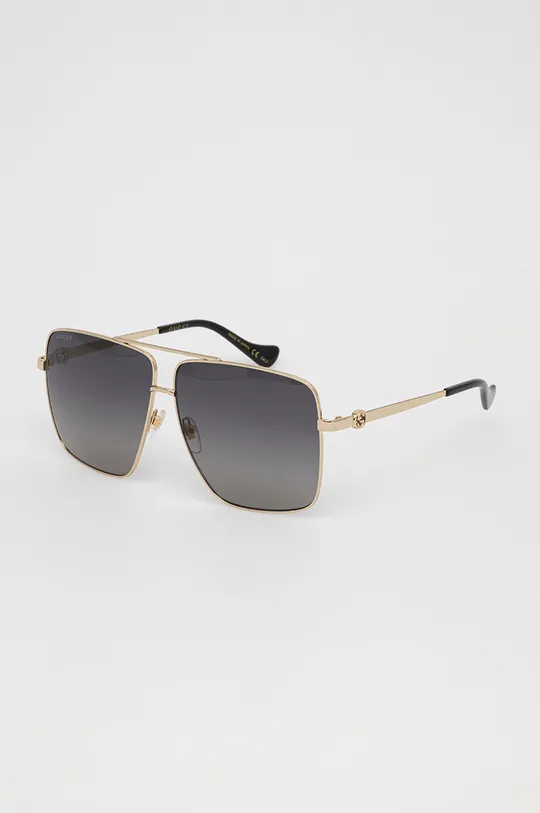 Солнцезащитные очки Gucci золотой
