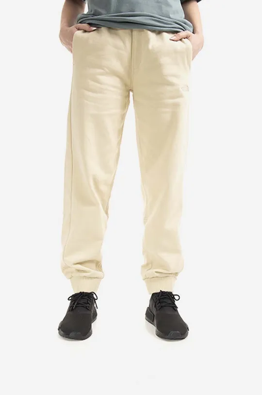 beżowy The North Face spodnie dresowe bawełniane Oversized Jogger Damski