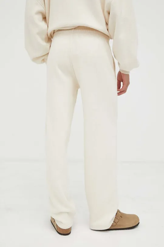 Odzież American Vintage spodnie dresowe bawełniane MXY05A beżowy