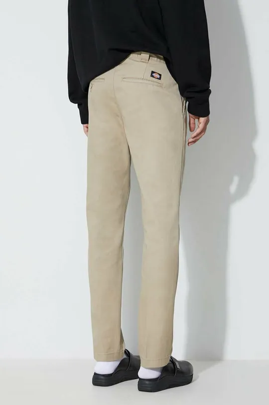 Dickies trousers  Basic material: 65% Polyester, 35% Cotton Pocket lining: 70% Polyester, 30% Cotton