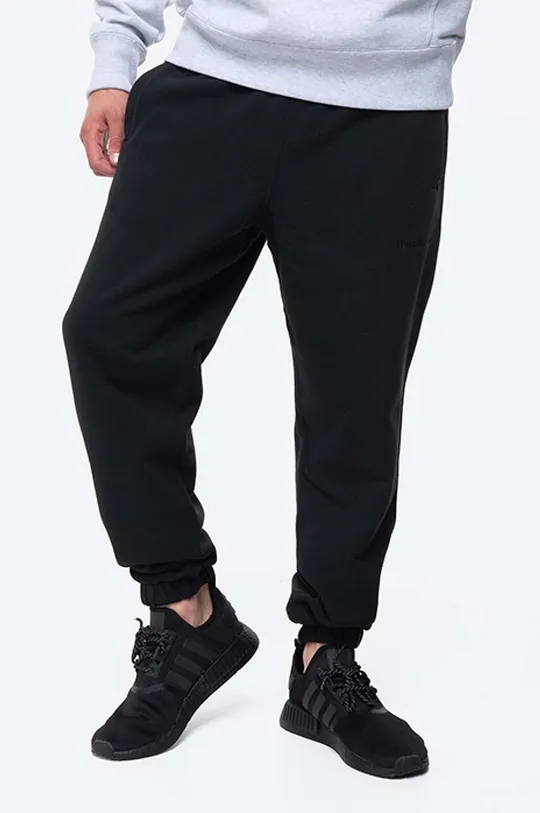 černá Bavlněné tepláky adidas Originals x Pharrell Williams Unisex