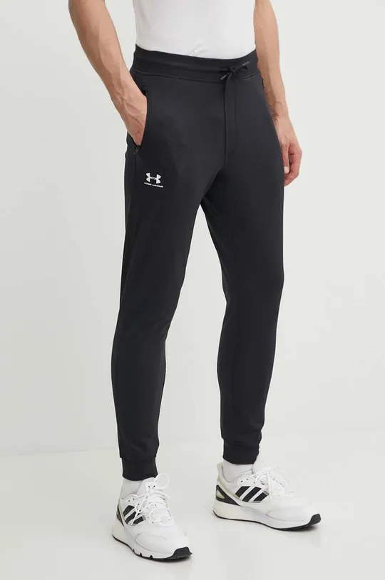 čierna Nohavice Under Armour 1290261. Pánsky