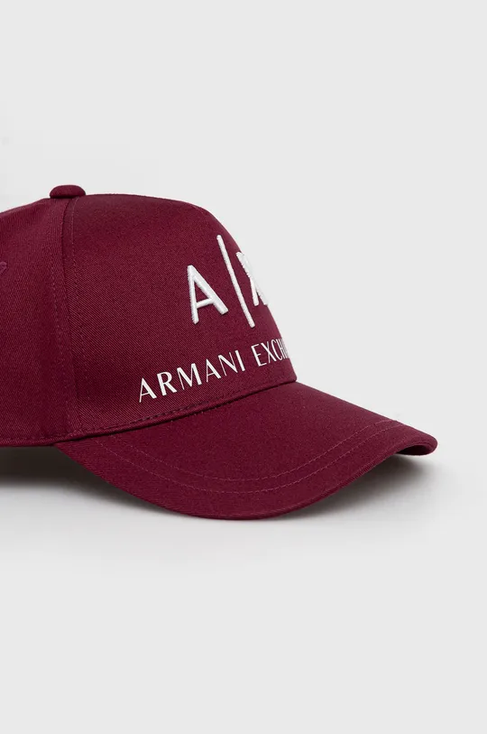 Βαμβακερό καπέλο Armani Exchange  Κύριο υλικό: 100% Βαμβάκι 100% Βαμβάκι Φόδρα: 100% Βαμβάκι Προσθήκη: 100% Φυσικό δέρμα