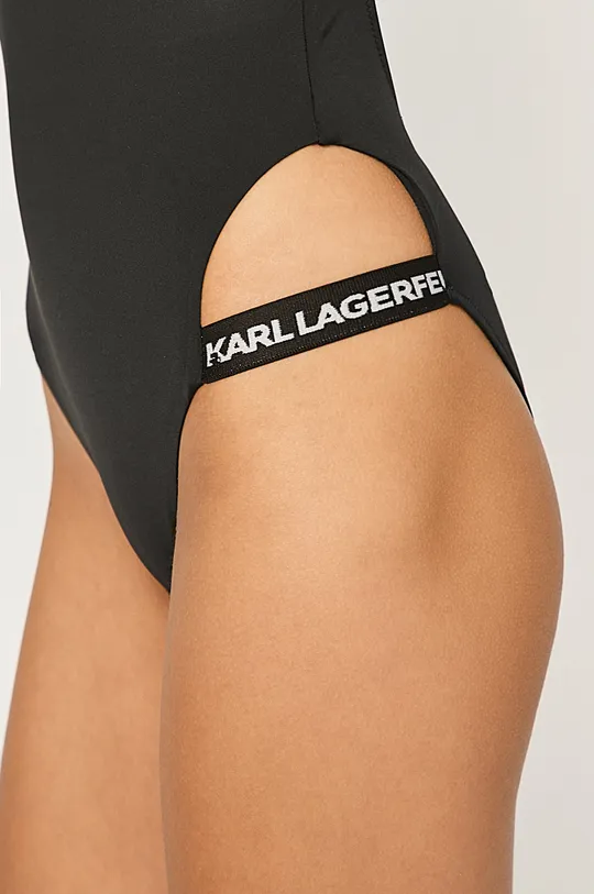Karl Lagerfeld - Plavky  1. látka: 18% Elastan, 82% Polyamid 2. látka: 16% Elastan, 84% Polyamid