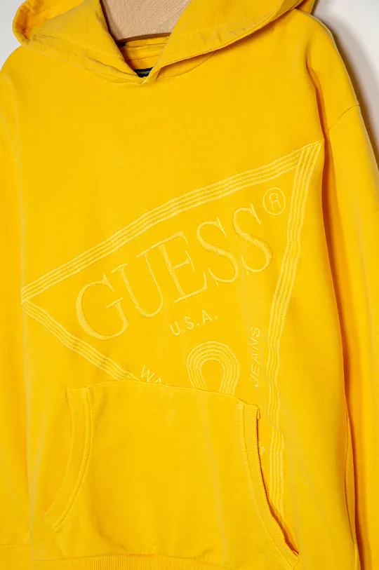 Guess Jeans - Bluza bawełniana dziecięca 116-175 cm żółty