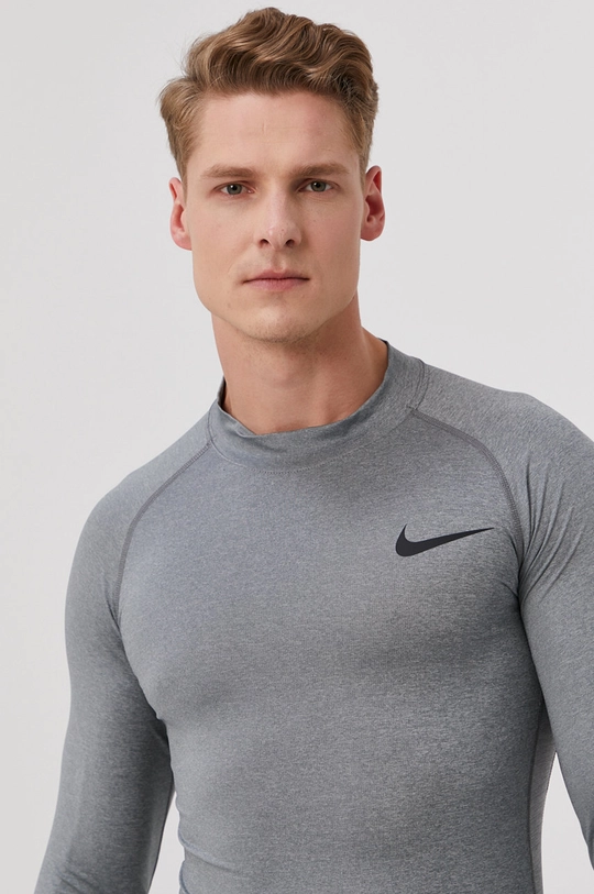 Tričko s dlhým rukávom Nike  Základná látka: 91% Polyester, 9% Spandex Prvky: 92% Polyester, 8% Spandex