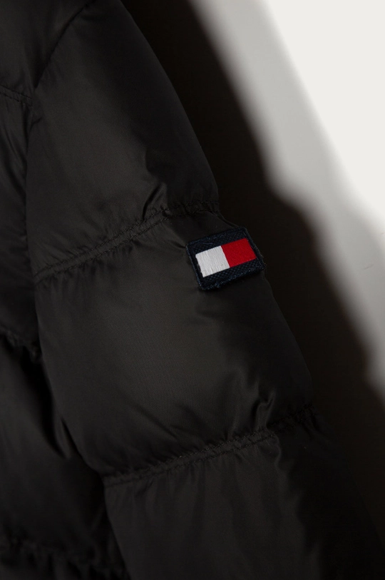 Tommy Hilfiger - Dječja pernata jakna 104-176 cm  Postava: 100% Poliester Ispuna: 30% Perje, 70% Pačje perje Temeljni materijal: 100% Poliester Manžeta: 88% Pamuk, 2% Elastan, 10% Poliester