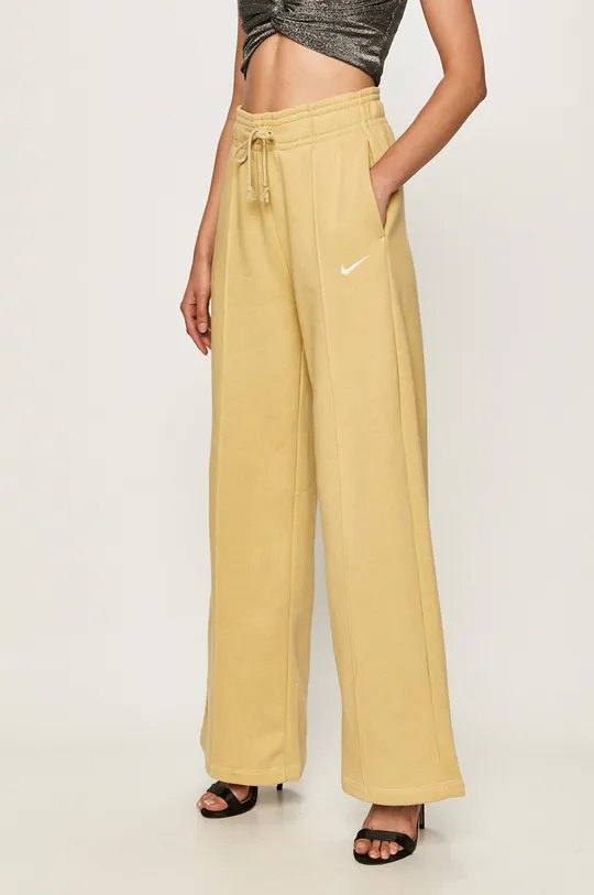 жовтий Nike Sportswear - Штани Жіночий