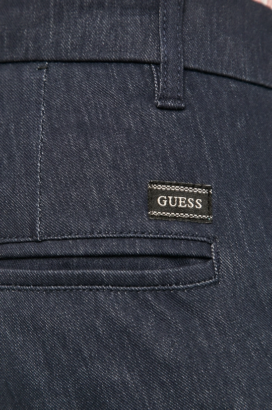 tmavomodrá Guess Jeans - Nohavice