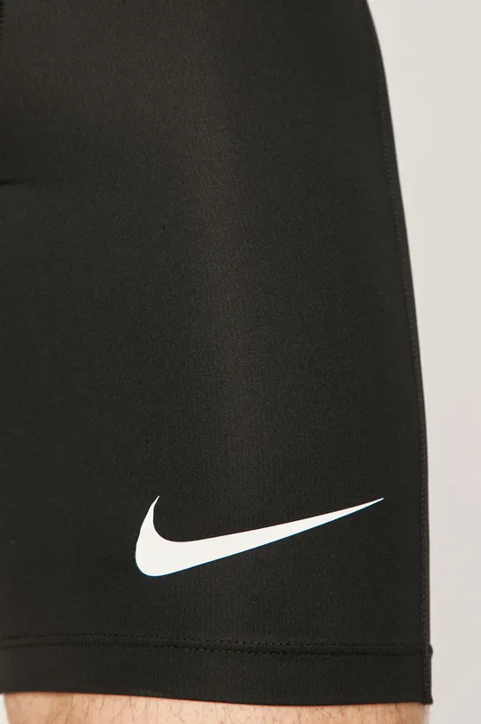 Nike - Šortky  1. látka: 10% Elastan, 90% Polyester 2. látka: 8% Elastan, 92% Polyester 3. látka: 11% Elastan, 46% Nylón, 43% Polyester