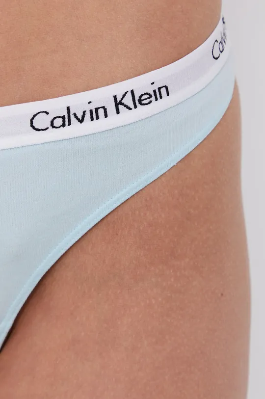 Στρινγκ Calvin Klein Underwear  Υλικό 1: 90% Βαμβάκι, 10% Σπαντέξ Υλικό 2: 9% Σπαντέξ, 64% Νάιλον, 27% Πολυεστέρας