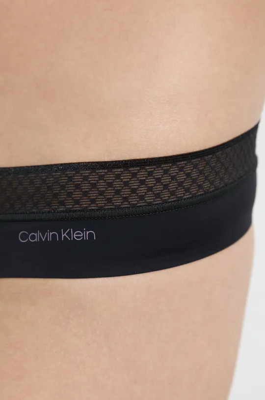 Calvin Klein Underwear Stringi Materiał zasadniczy: 82 % Nylon, 18 % Elastan, Inne materiały: 82 % Poliamid z recyklingu, 18 % Elastan