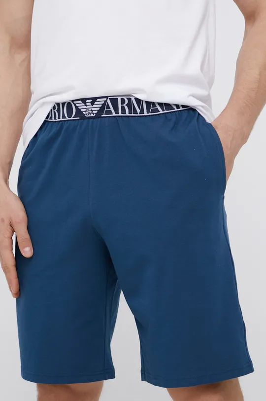 Піжама Emporio Armani Underwear  Основний матеріал: 95% Бавовна, 5% Еластан Вставки: 10% Еластан, 23% Поліамід, 67% Поліестер