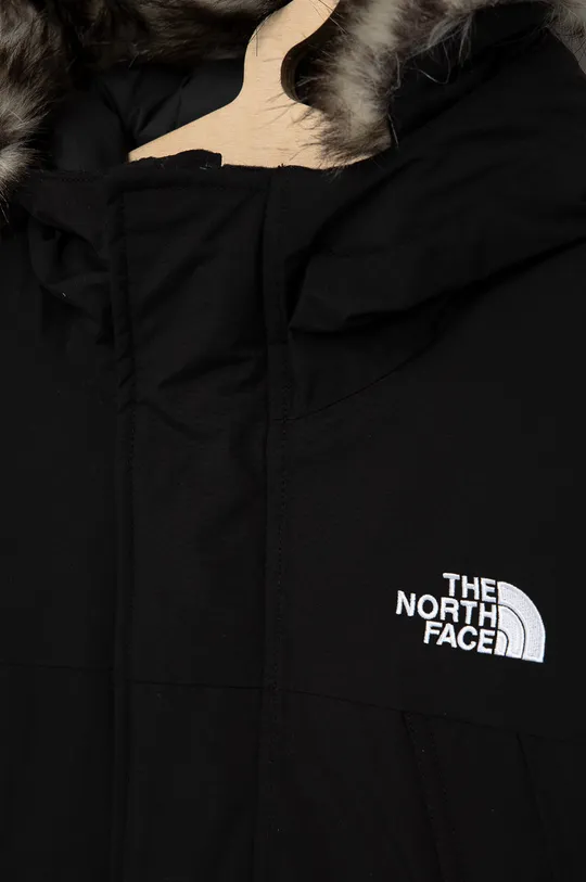 Дитяча пухова куртка The North Face  Основний матеріал: 100% Нейлон Підкладка: 100% Поліестер Наповнювач: 80% Пух, 20% Пір'я Хутро: 70% Акрил, 17% Поліестер, 13% Модакрил Наповнювач капюшону: 100% Поліестер
