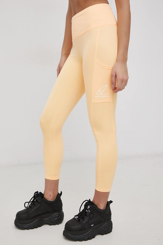 New Balance Legginsy WP11591LMO pomarańczowy