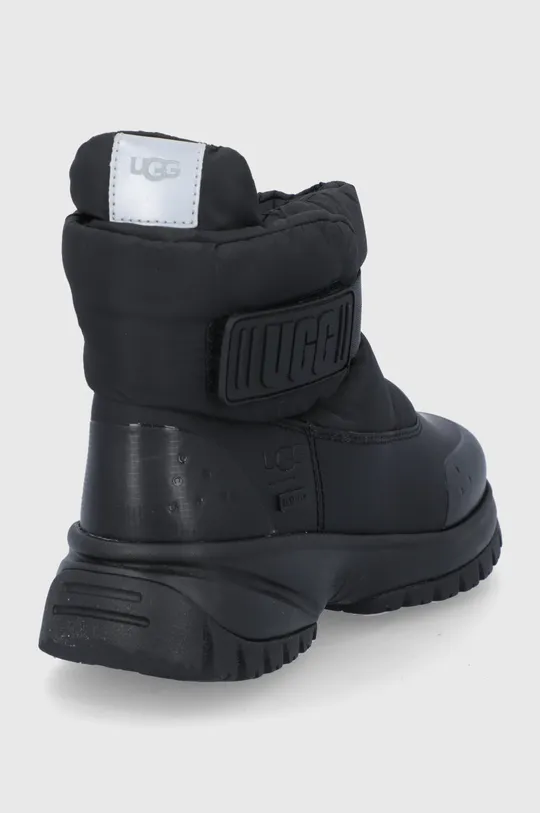 UGG snow boots  Uppers: Synthetic material, Textile material Inside: Textile material, Wool Outsole: Synthetic material