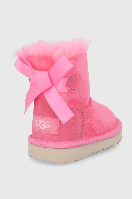 Детские замшевые сапоги UGG Bailey Bow II Mini  Голенище: Замша Внутренняя часть: Шерсть Подошва: Синтетический материал