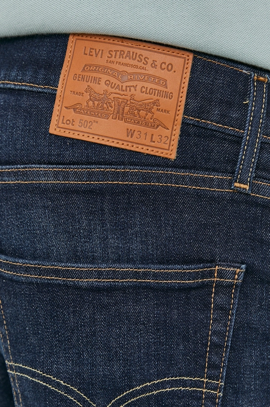 granatowy Levi's jeansy 502