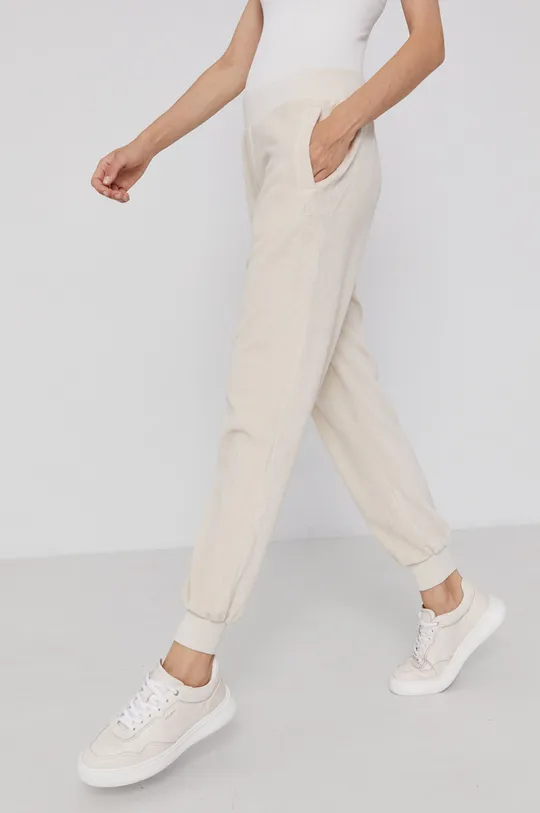 beżowy Calvin Klein Jeans Spodnie J20J216432.4890 Damski