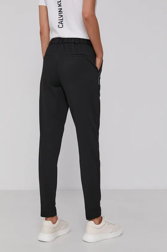 Nohavice Calvin Klein Jeans  4% Elastan, 77% Polyester, 19% Viskóza