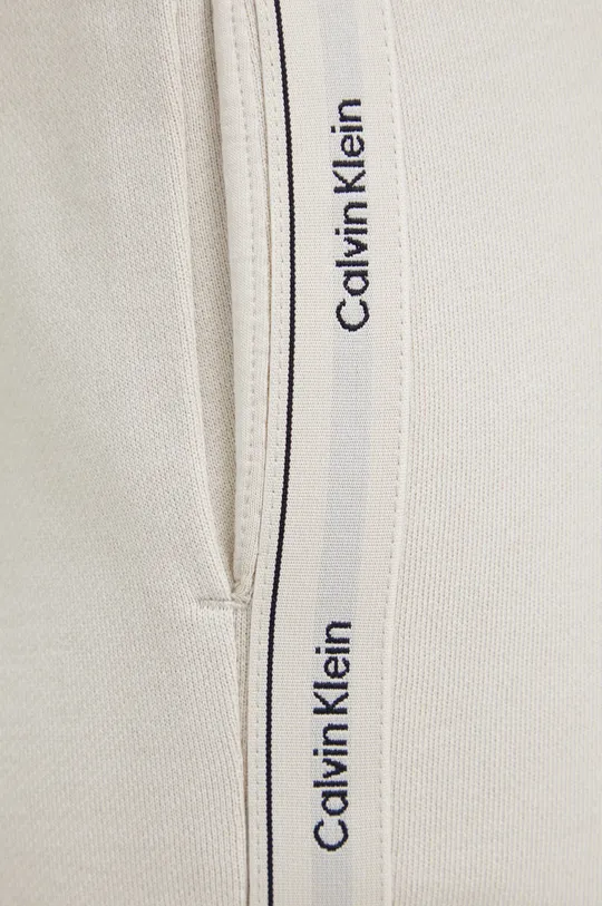 beżowy Calvin Klein Spodnie