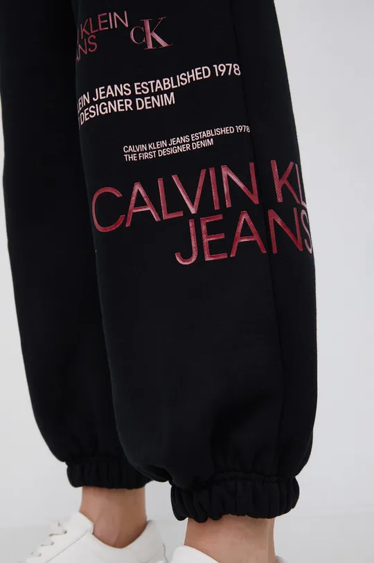 czarny Calvin Klein Jeans Spodnie J20J216588.4890