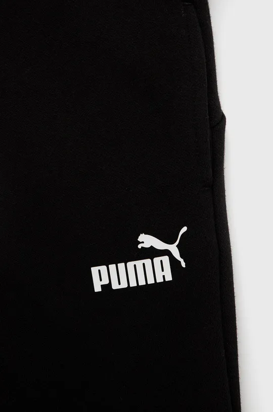 Dětské kalhoty Puma 587038  Hlavní materiál: 66% Bavlna, 34% Polyester Podšívka kapsy: 100% Bavlna Stahovák: 98% Bavlna, 2% Elastan