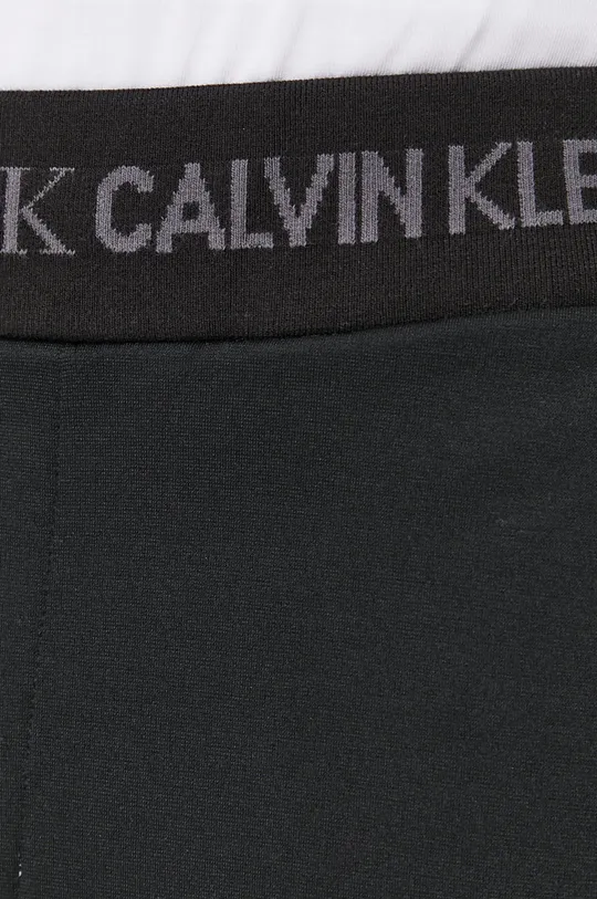 czarny Calvin Klein Jeans Spodnie J30J318161.4890