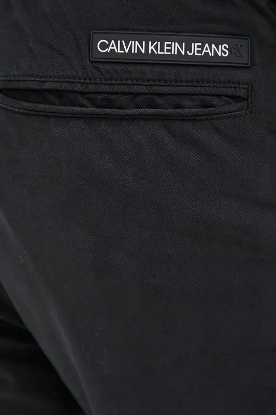 czarny Calvin Klein Jeans Spodnie J30J319486.4890