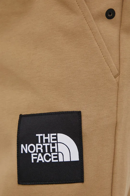 бежевый Брюки The North Face