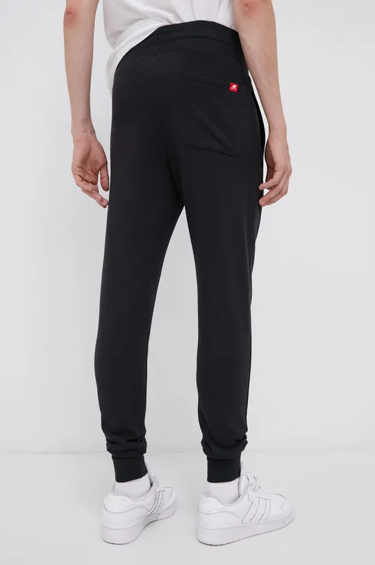 New Balance pantaloni MP11590BK  Materialul de baza: 60% Bumbac, 40% Poliester  Banda elastica: 57% Bumbac, 5% Elastan, 38% Poliester