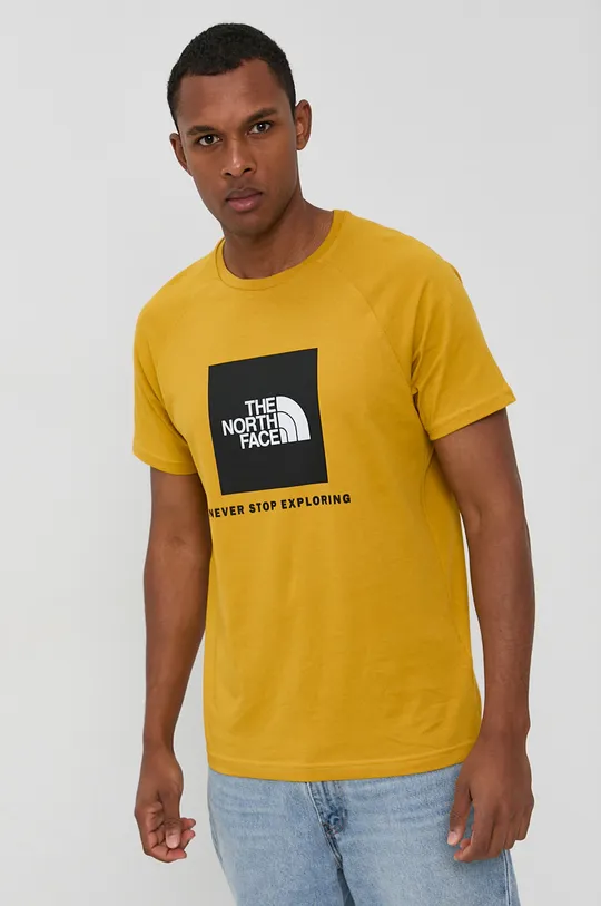 Бавовняна футболка The North Face жовтий