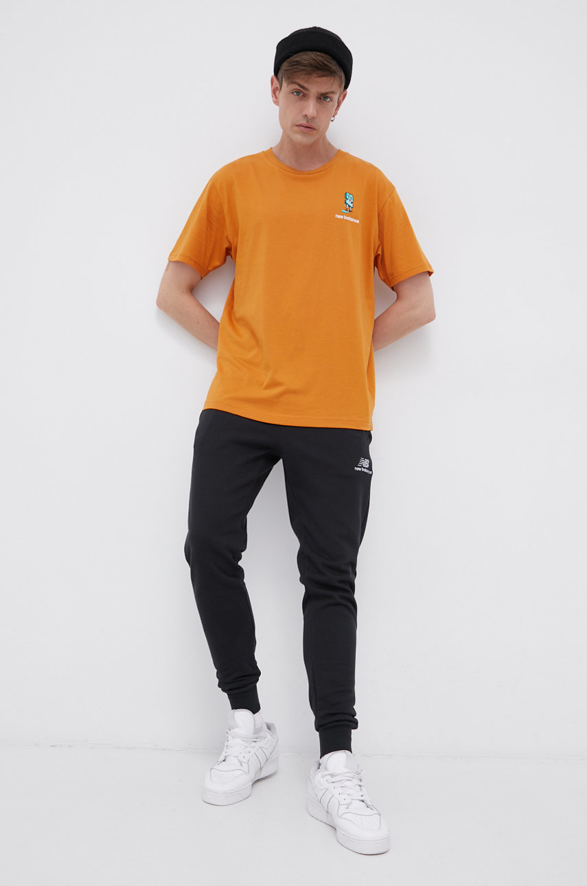 New Balance T-shirt bawełniany MT13573MOE pomarańczowy