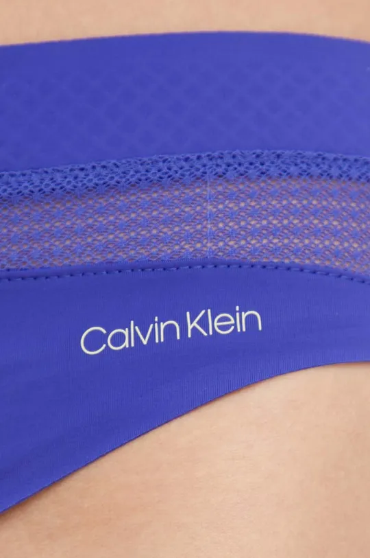Στρινγκ Calvin Klein Underwear  Κύριο υλικό: 80% Νάιλον, 20% Σπαντέξ Προσθήκη: 75% Νάιλον, 25% Σπαντέξ