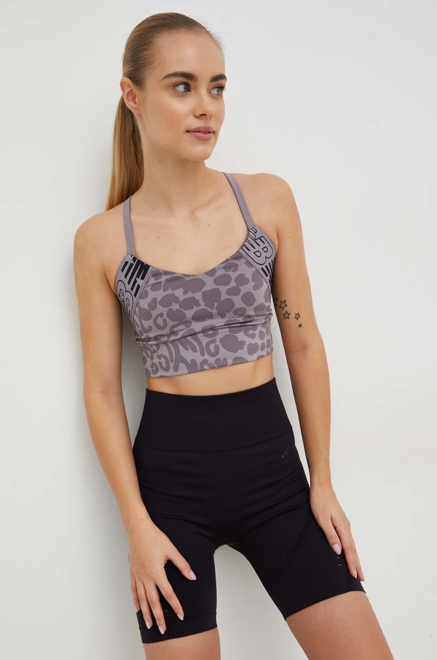 Спортивный бюстгальтер New Balance Relentless цвет фиолетовый узорный ...