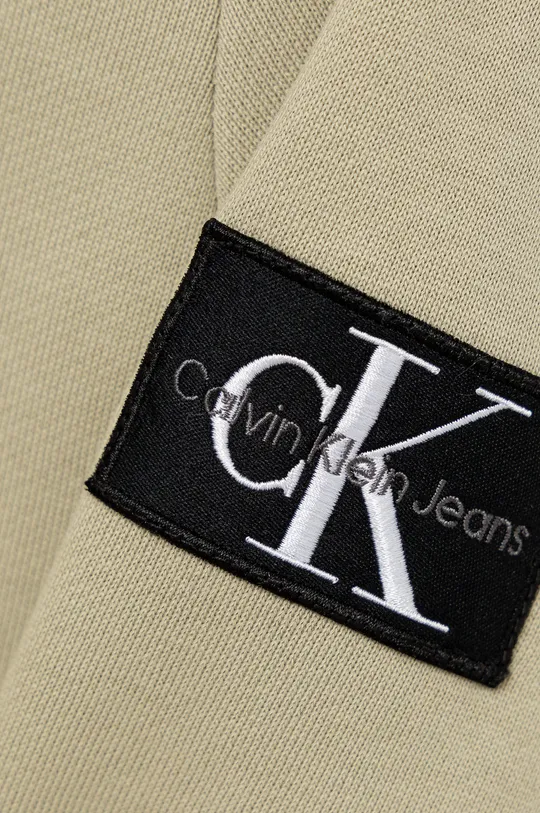 Otroška bombažna mikica Calvin Klein Jeans  Glavni material: 100% Bombaž Patent: 98% Bombaž, 2% Elastan
