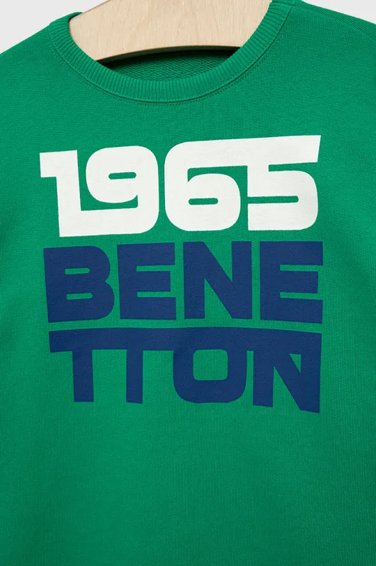 Παιδική βαμβακερή μπλούζα United Colors of Benetton  Κύριο υλικό: 100% Βαμβάκι Πλέξη Λαστιχο: 96% Βαμβάκι, 4% Σπαντέξ