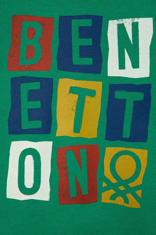 Παιδική βαμβακερή μπλούζα United Colors of Benetton  Κύριο υλικό: 100% Βαμβάκι Εφαρμογή: 95% Βαμβάκι, 5% Σπαντέξ