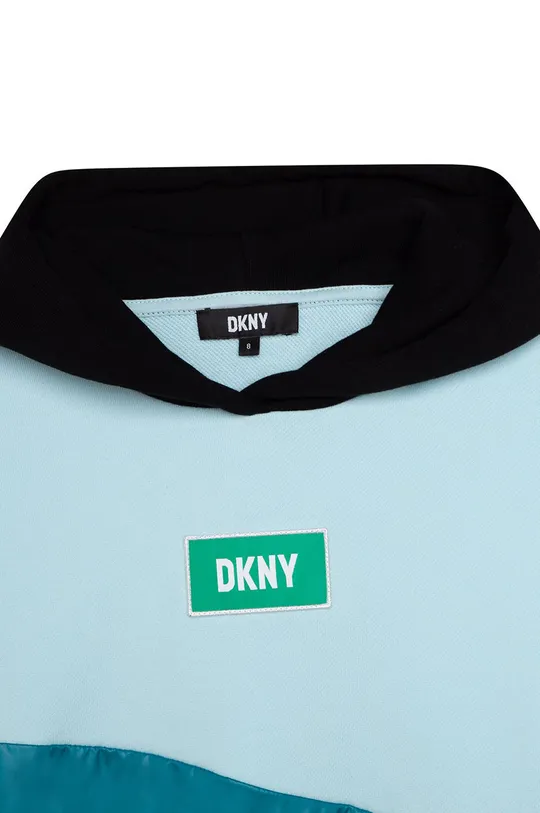 Παιδική μπλούζα DKNY  Άλλα υλικά: 98% Βαμβάκι, 2% Σπαντέξ Υλικό 1: 87% Βαμβάκι, 13% Πολυεστέρας Υλικό 2: 100% Πολυεστέρας