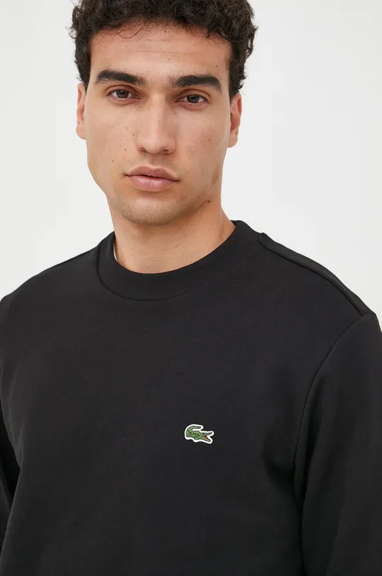black Lacoste sweatshirt