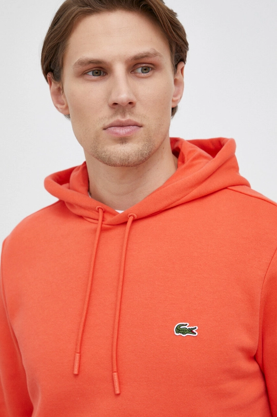 orange Lacoste sweatshirt