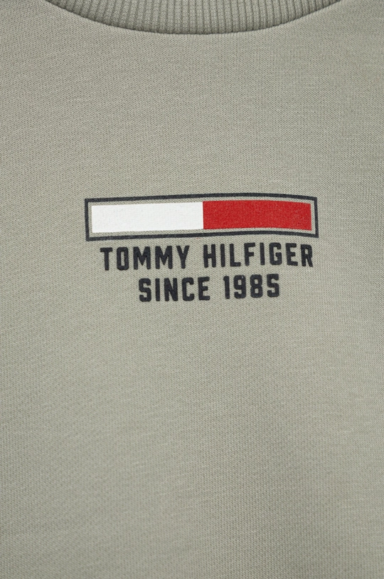 Dječja trenirka Tommy Hilfiger  Temeljni materijal: 88% Pamuk, 12% Poliester Manžeta: 96% Pamuk, 4% Elastan