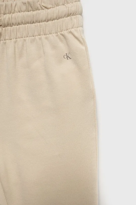 beżowy Calvin Klein Jeans dres dziecięcy IN0IN00017.9BYY