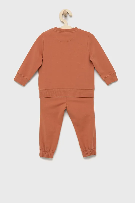 Дитячий спортивний костюм Calvin Klein Jeans помаранчевий