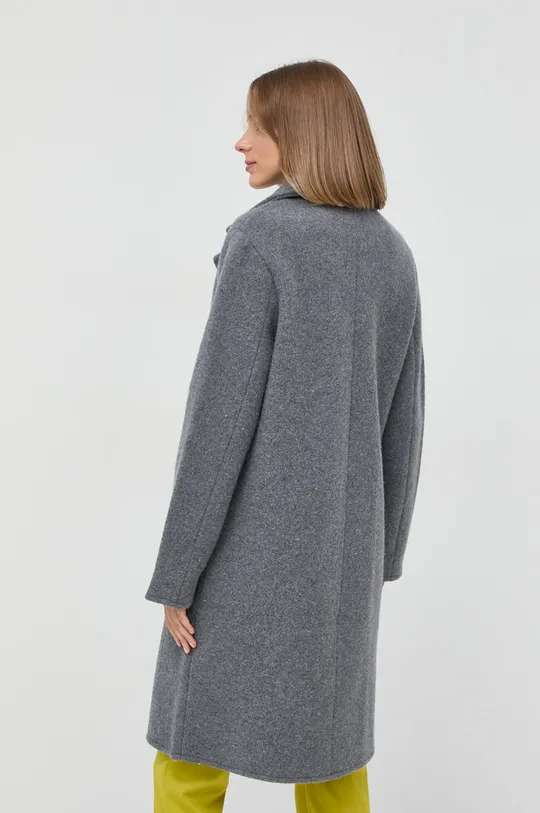 Шерстяное пальто Emporio Armani  Основной материал: 85% Новая шерсть, 15% Хлопок Отделка: 100% Новая шерсть