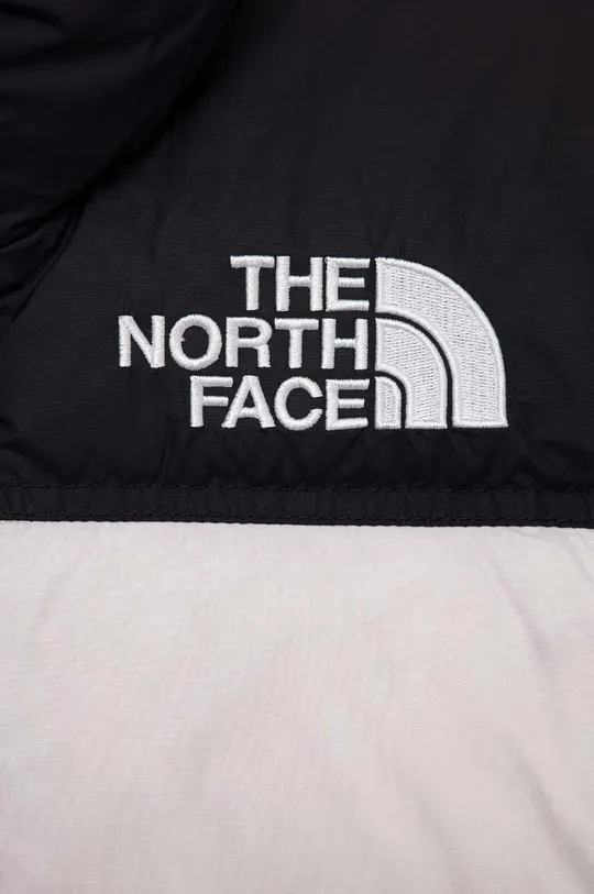 Детская пуховая куртка The North Face  Основной материал: 100% Нейлон Подкладка: 100% Полиэстер Наполнитель: 90% Пух, 10% Перья