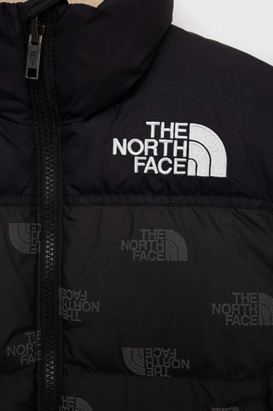 The North Face kurtka puchowa dziecięca TEEN PRINTED 1996 RETRO NUPTSE JACKET  Podszewka: 100 % Poliester Wypełnienie: 90 % Puch, 10 % Pierze Materiał 1: 100 % Poliester Materiał 2: 100 % Poliamid