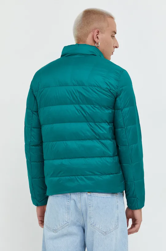 Pernata jakna Tommy Jeans  Temeljni materijal: 100% Poliamid Postava: 100% Poliamid Ispuna: 90% Pačje paperje, 10% Perje ptica